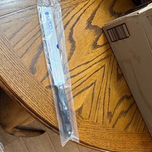 Cutco Serrated Knife with Black Handle